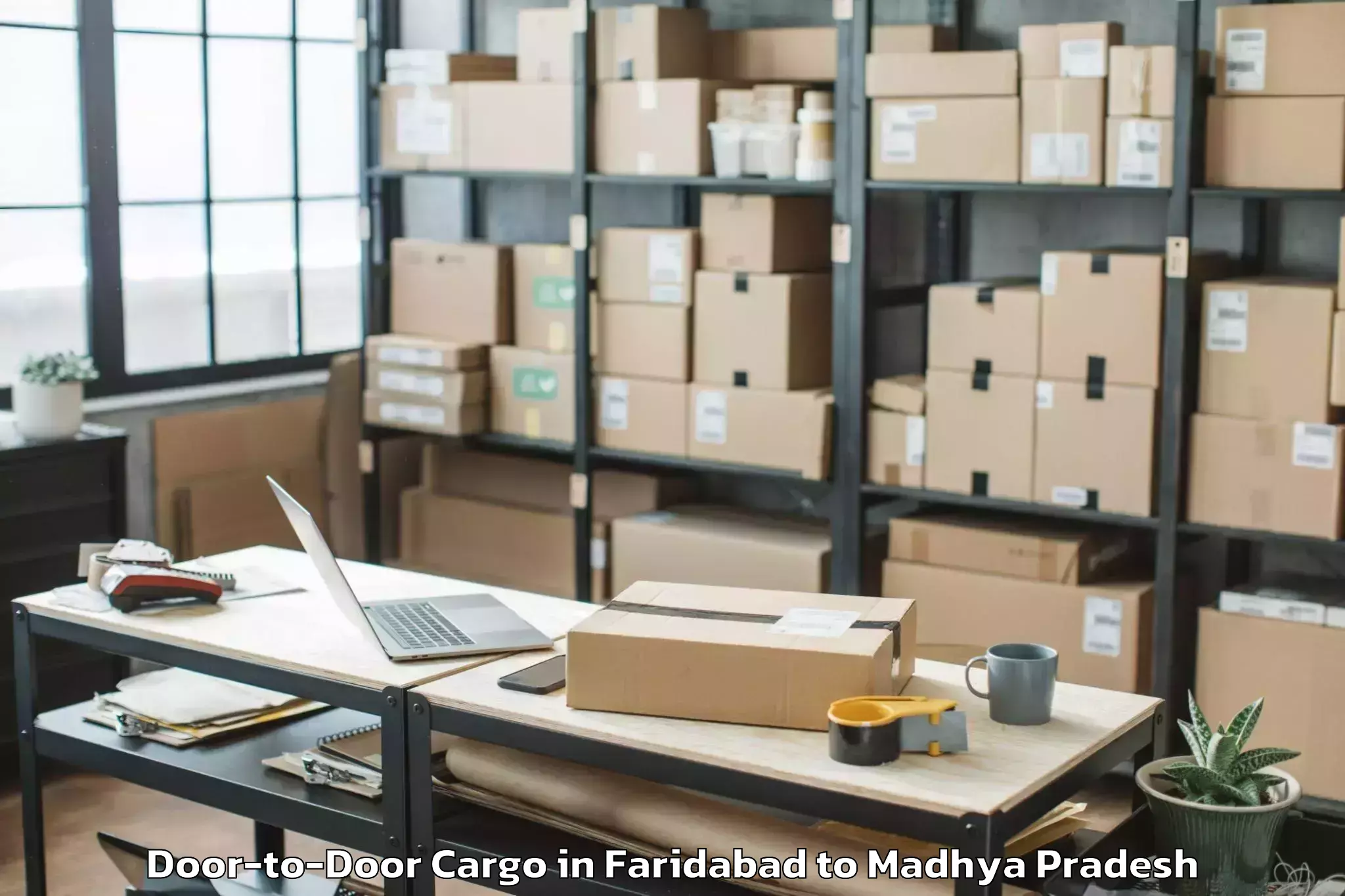 Top Faridabad to Kalapipal Mandi Door To Door Cargo Available